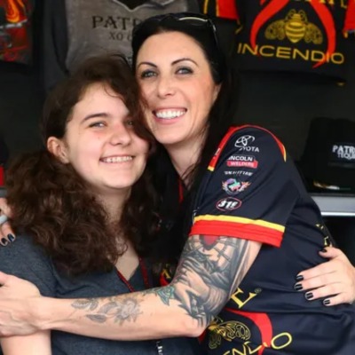 Alexis DeJoria with her daughter, Isabella, during qualifying of Gatornational at Auto Plus Raceway.